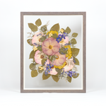 Pressed flower preservation with purple, pink, yellow, and blue florals. Wedding bouquet preservation 16x20 frame in Barn Wood.