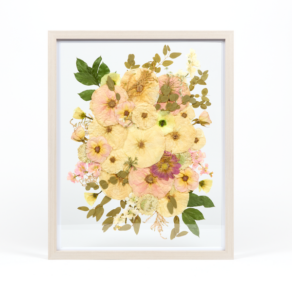 Floral preservation pressed flower frame with pink, white, and green pressed florals. 16x20 gray wood frame bridal bouquet preservation design.