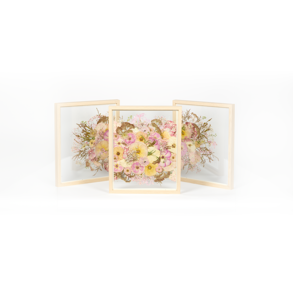 Our largest pressed wedding bouquet frame option offered as a trio of continued pressed florals to elegantly span a large wall.