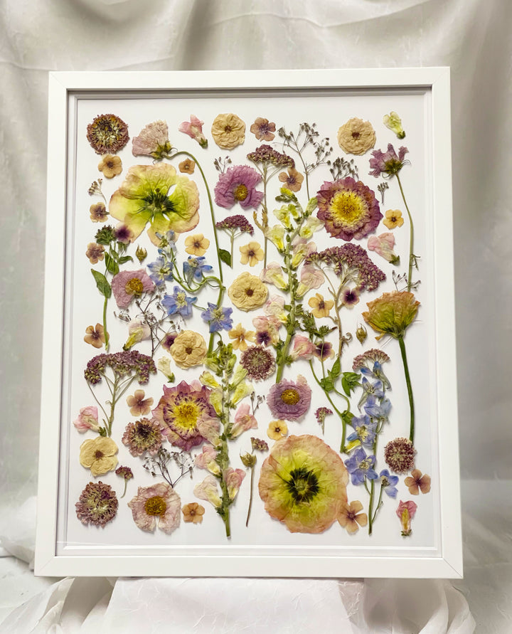 Final design of a 16x20 white wood pressed flower frame created from client inspiration photos, made by Element Preservation. 