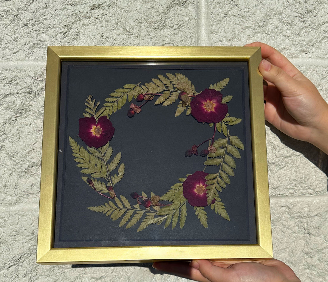 10x10 Gold Wood frame with black background and pressed seasonal florals 