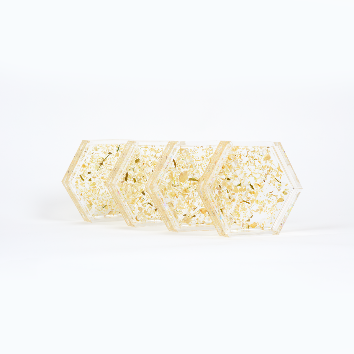 A set of dry petal confetti coasters shown as a way to preserve a bouquet that's already dry. 