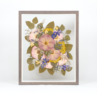 Pressed flower preservation with purple, pink, yellow, and blue florals. Wedding bouquet preservation 16x20 frame in Barn Wood. 