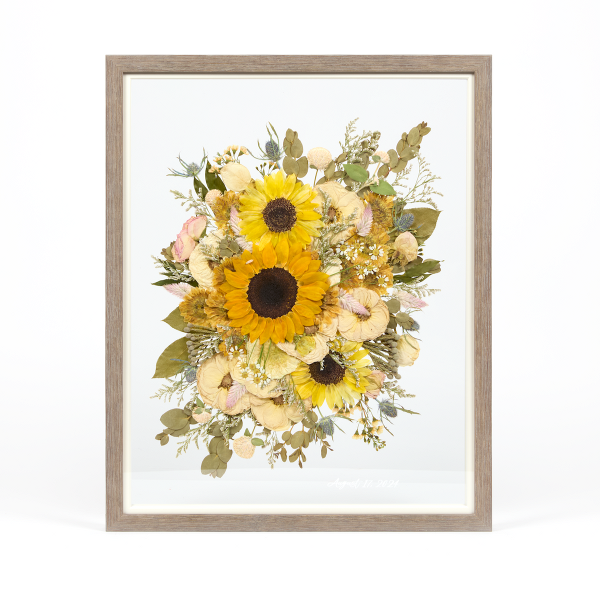 Pressed flower preservation with pressed sunflowers, roses, and greenery. Wedding bouquet preservation 16x20 frame in Barn Wood. 