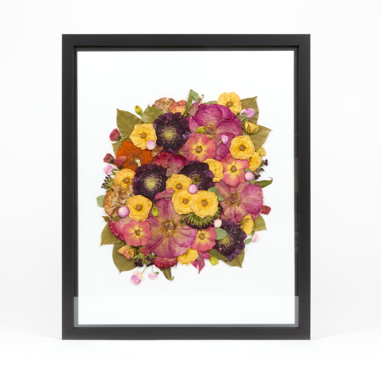 Floral preservation pressed flower frame with all red, pink, and yellow pressed florals. 16x20 black wood frame design. 