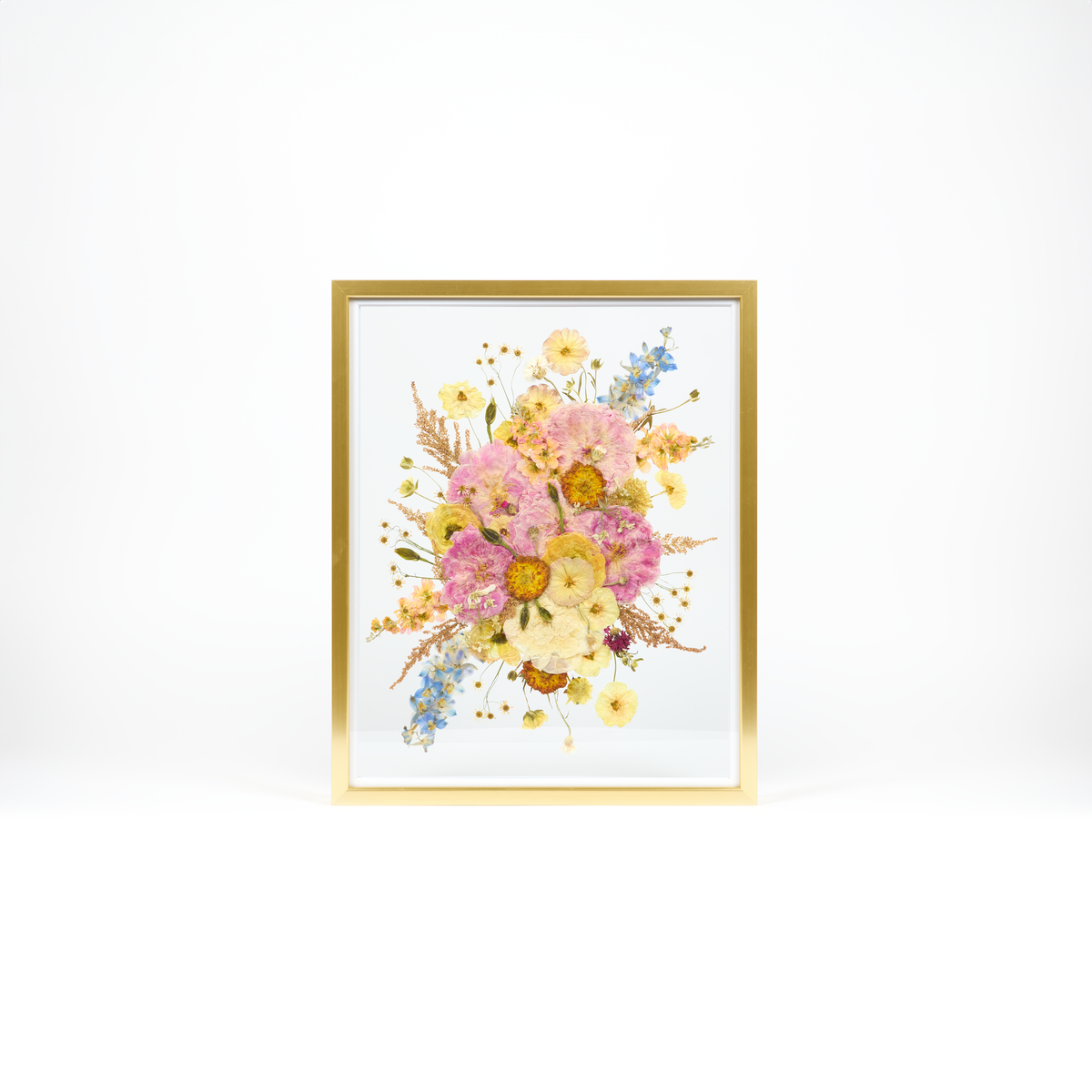 Floral preservation pressed flower frame with bright pink, white, yellow, and blue pressed florals. 16x20 gold wood frame design. 