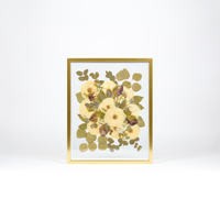 Floral preservation pressed flower frame with white roses, pressed calla lilies, and pressed greenery. 16x20 gold wood pressed bridal bouquet frame design. 