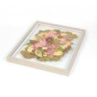 Floral preservation pressed flower frame with pink, white, and red pressed florals. 16x20 gray wood frame bridal bouquet preservation design.