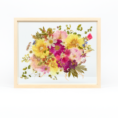 Bridal bouquet preservation in a 16x20 natural wood frame. Pink, white, and yellow pressed florals fill the frame with a floating glass background. 