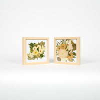 Pressed flower wedding preservation with two 10x10 inch frame bundle offering in natural wood. 