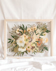 Wedding flowers preserved in time in a floating glass frame made of natural wood. 