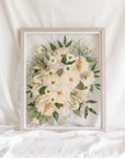 A custom preservation piece made from a wedding bouquet that can be hung on the wall as art. 