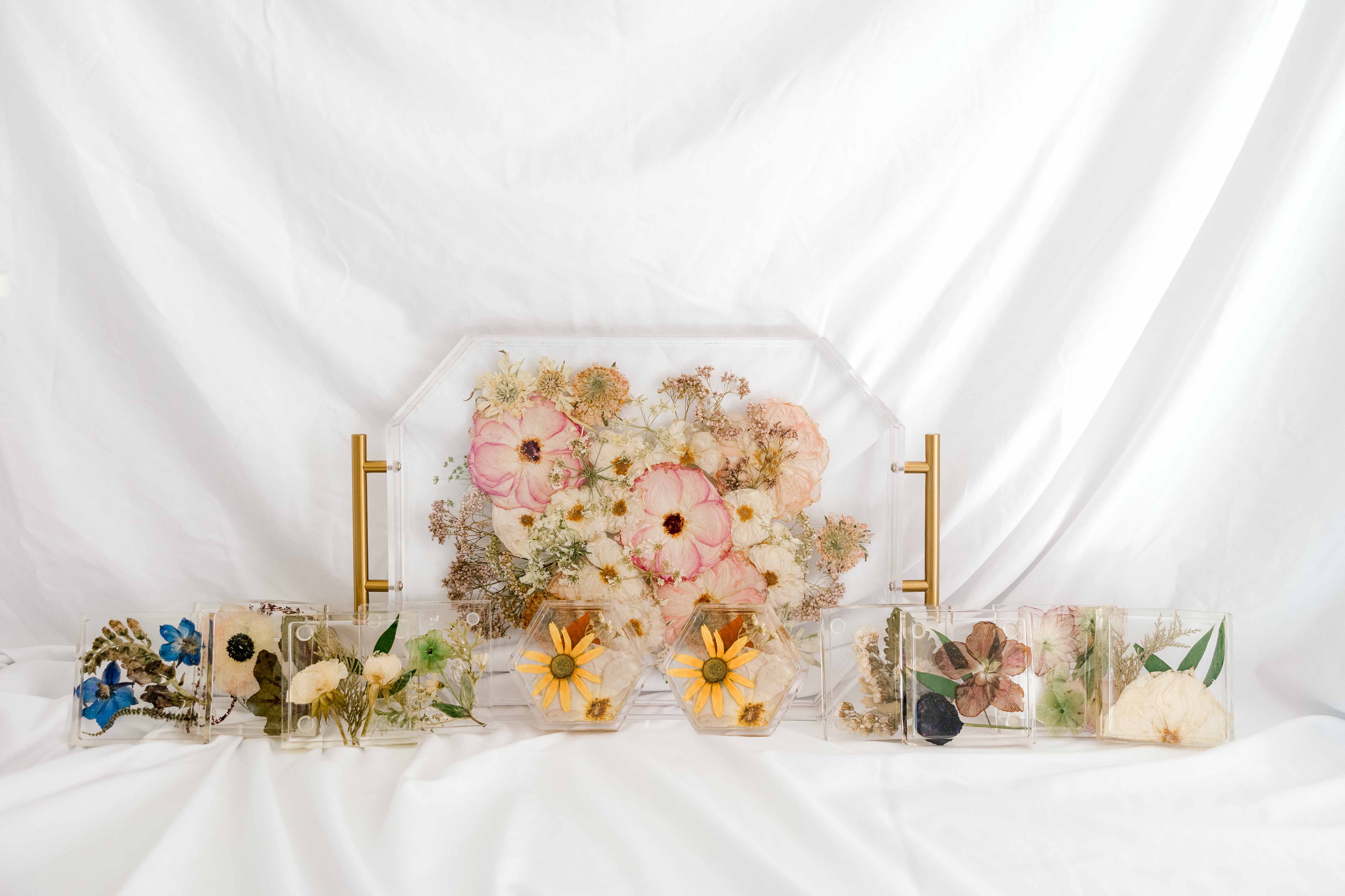 Functional Floral Bundle with geometric serving, square coasters, and hexagon ring holders.