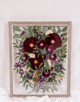 A cascading bouquet that was pressed into a barn wood frame. 