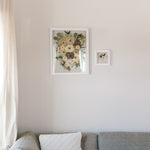 A 16x20 frame with a 6x6, mini frame makes up the Classic Bundle hung up on the wall.