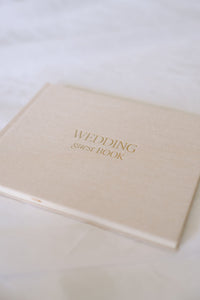 Hardcover wedding guest book in beige from Element Marketplace, shown from the front