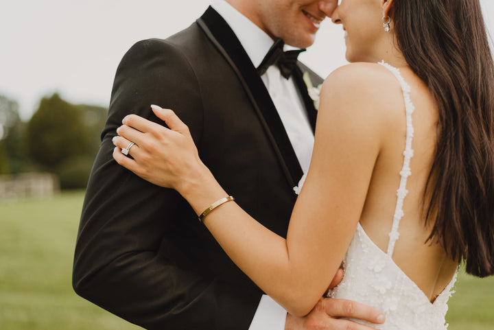 Emily Roebuck Photography of couple closely touching and smiling on wedding day