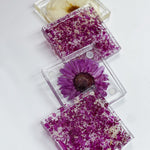 Examples of petal confetti square coasters and pressed flower coasters