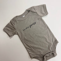 Hot off the press baby onesie in heather olive green