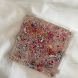 Square petal confetti coaster with silver flakes
