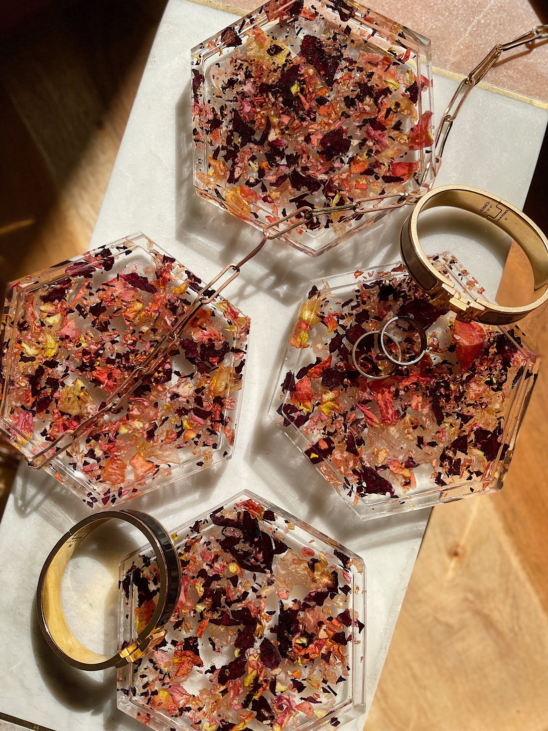 Hexagon petal confetti coasters as a jewelry dish
