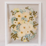 White 16x20 vertical frame with pressed flower burst of flowers design