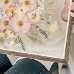 Close-up of the vinyl date addition to a 16x20 barn wood frame