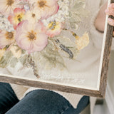 Close-up of the vinyl date addition to a 16x20 barn wood frame