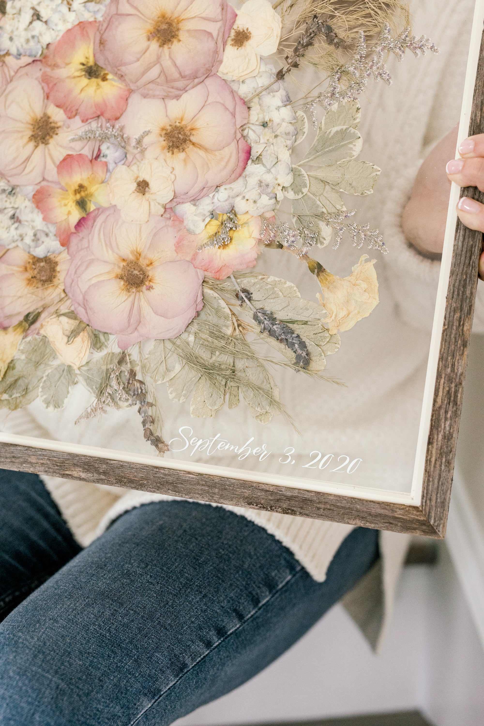 Close-up of the vinyl date addition to a 16x20 barn wood frame