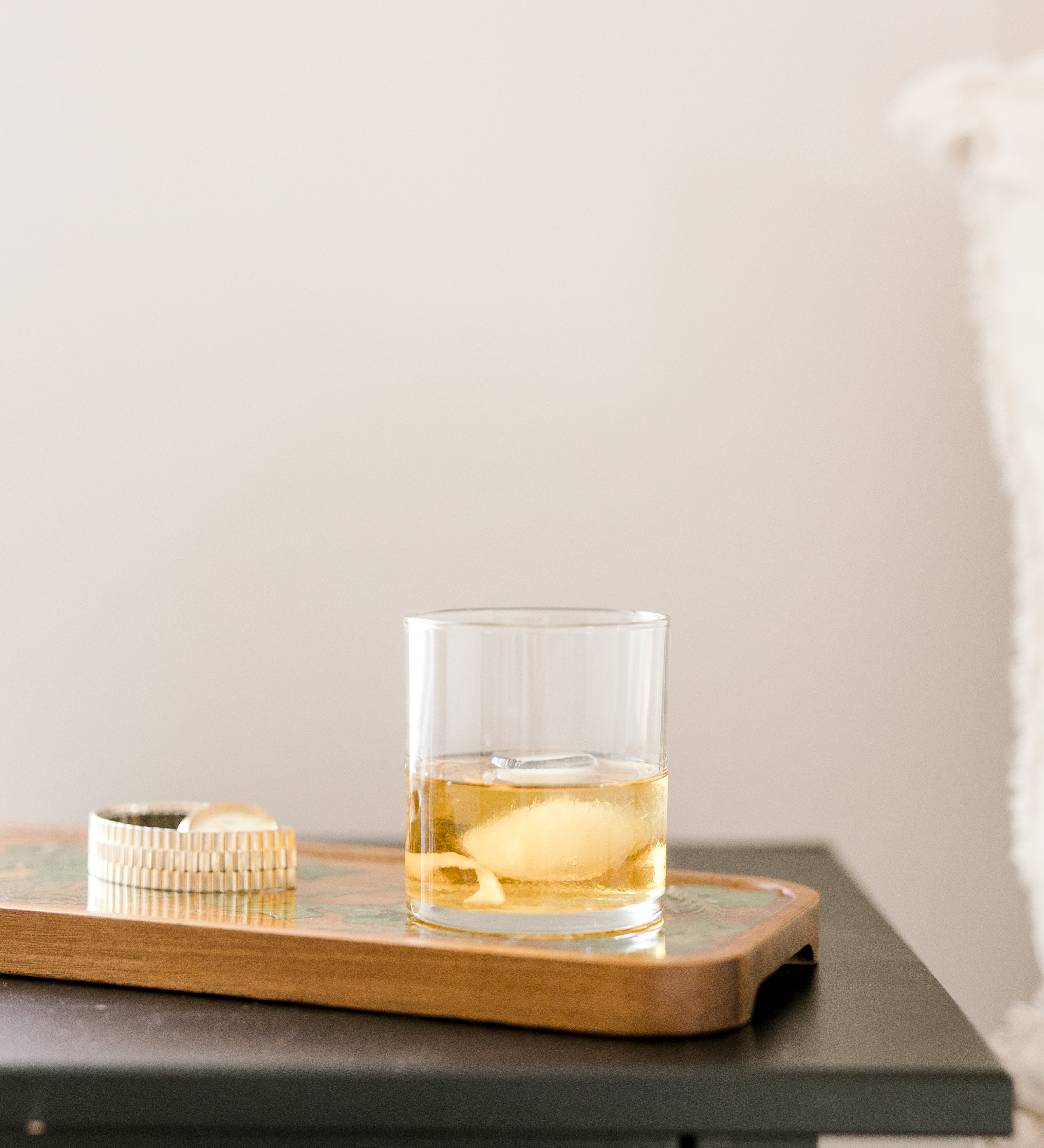 Showcasing wooden resin tray on night stand