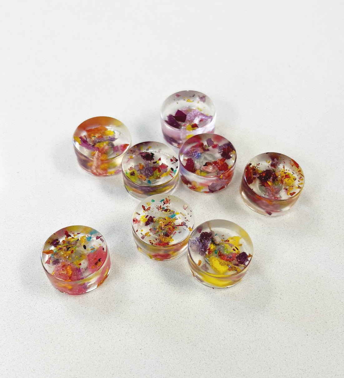Rainbow petal confetti magnets