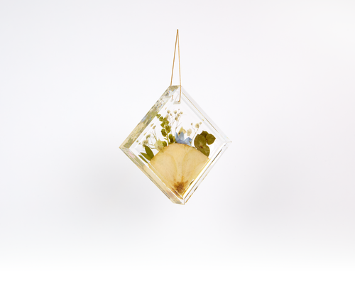 Pressed flower resin ornament for wedding bouquet preservation